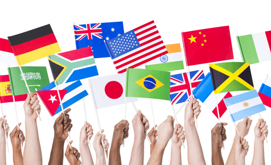 Hands waving international flags