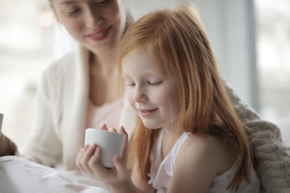 photo-of-girl-holding-ceramic-cup-3890629